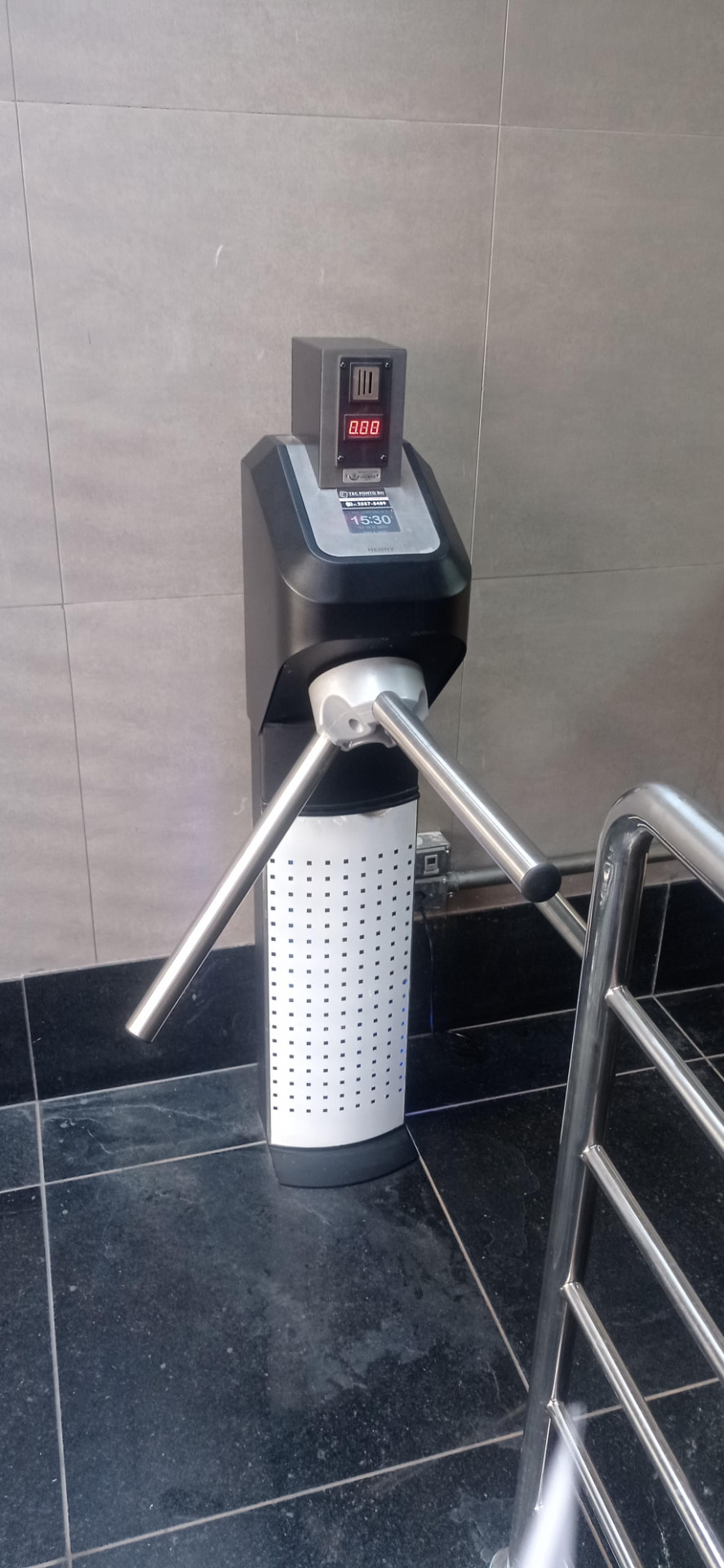 Detalhe de catraca com moedeira